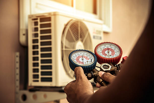 Professional Air Conditioning Service technician working in Baytown, TX